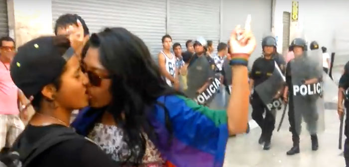 WATCH: Amazing Peruvian Lesbian Flicks Off Violent Police During Kiss-In Protest