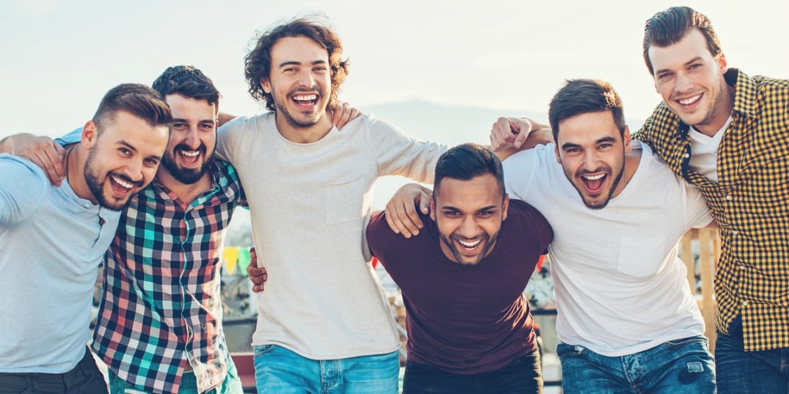 man-hugging Colombia LGBTQ candidates