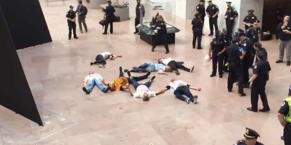 ‘Gays Against Guns’ Hold Disruptive ‘Die In’ at Senate House Before Being Detained by Police
