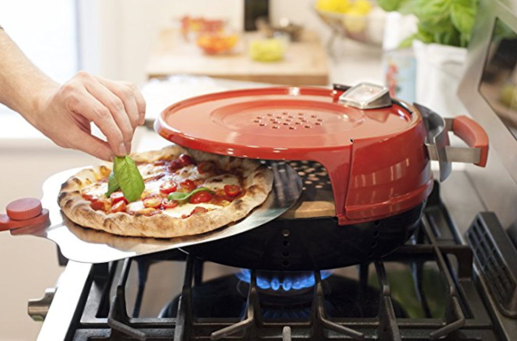 kitchen stuff overtop pizza oven
