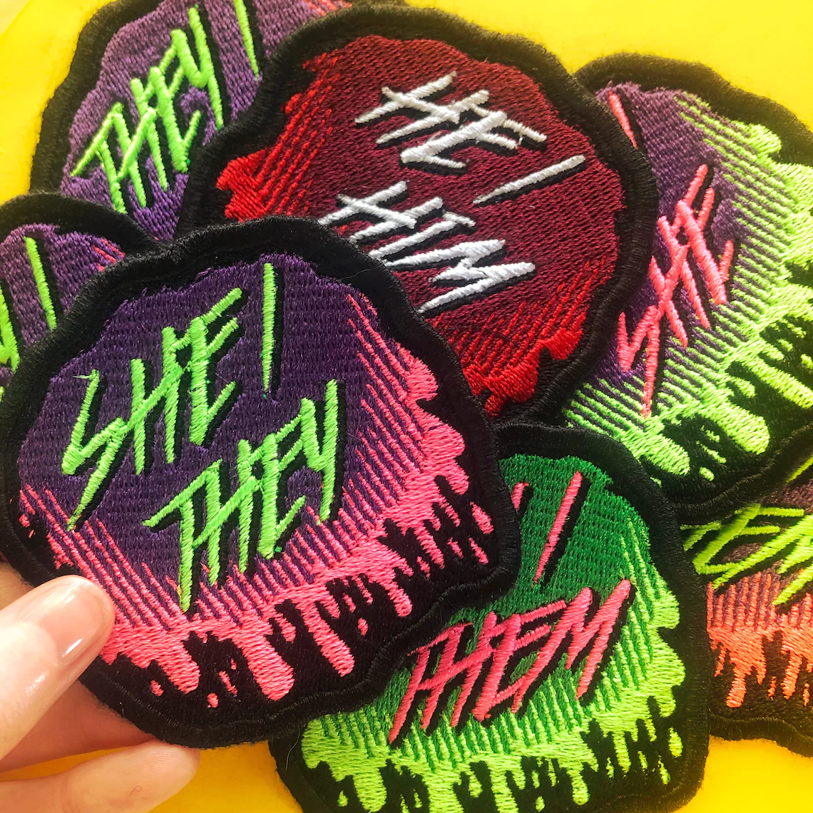 Deck Out Your Bags and Battle Jackets With Pronoun Patches and Pins